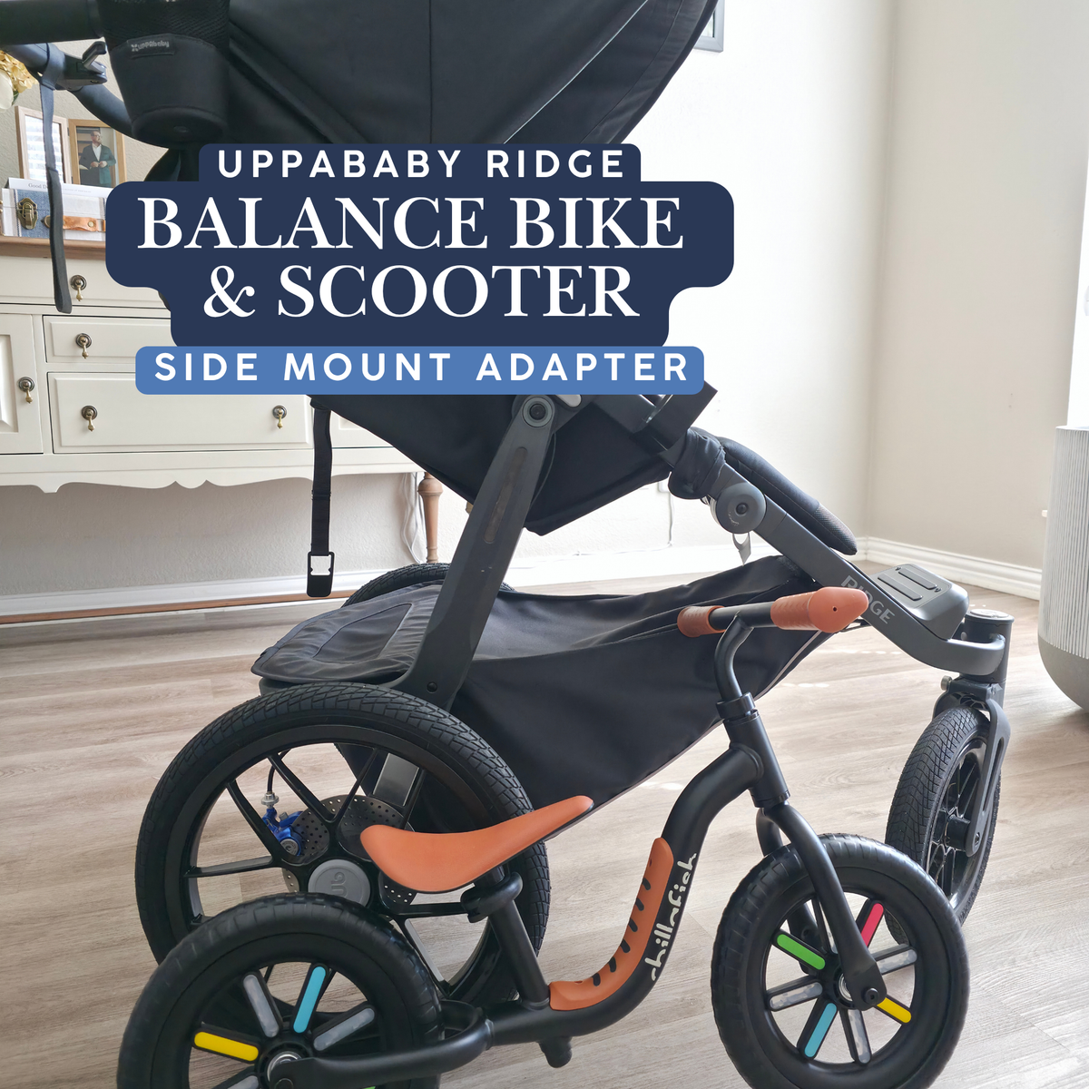 Stroller House balance bike and scooter side mount adapter for the UPPAbaby Ridge, shown with a balance bike alongside a black Ridge stroller.