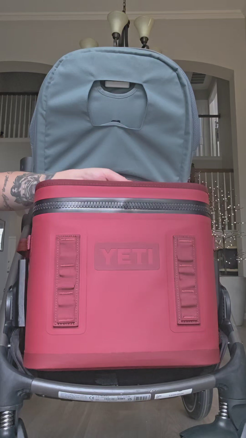 Step-by-step installation of the cooler mount on a CYBEX Gazelle S, hooking the YETI Hopper Flip's side straps onto the mount and seating it in the lower slot.