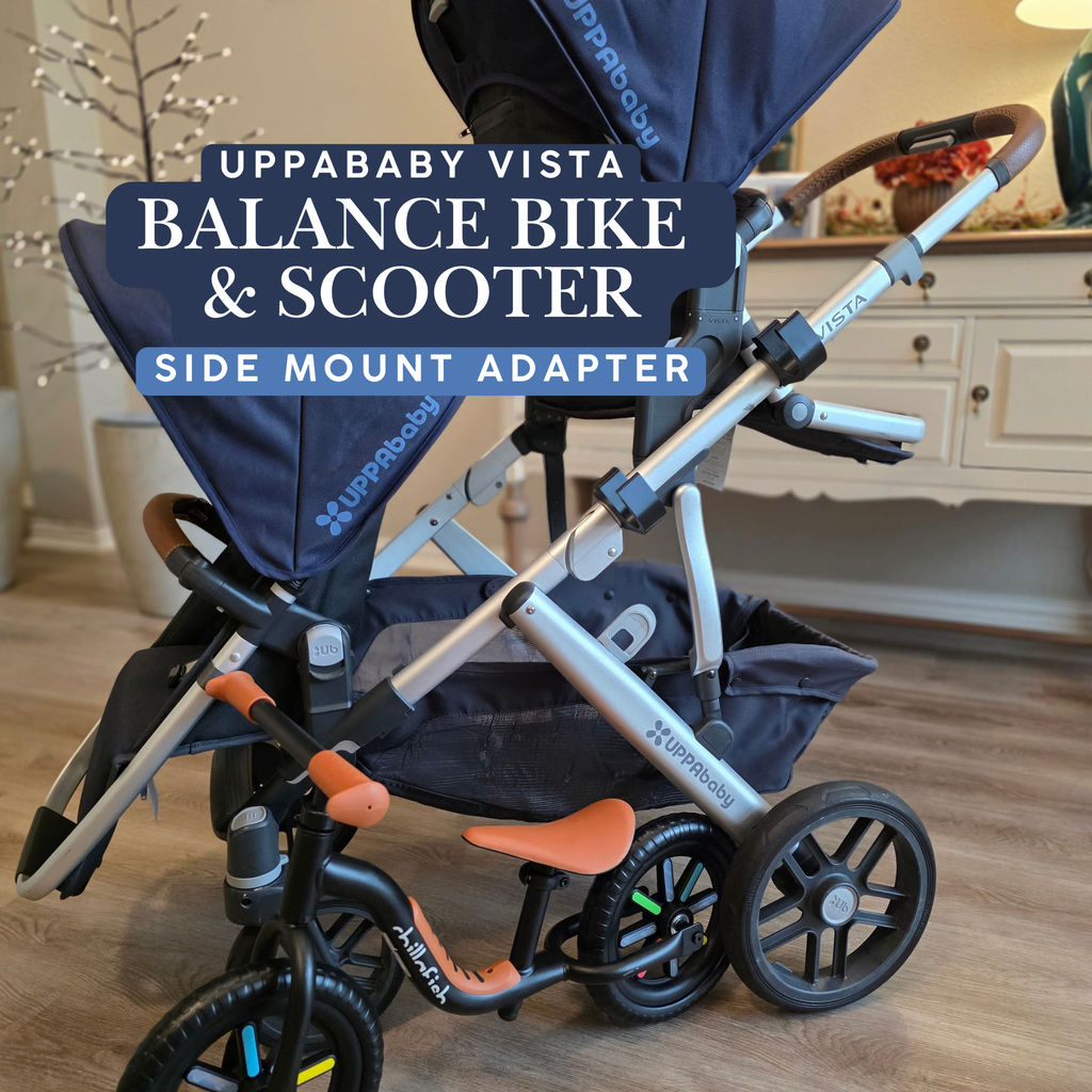 Stroller House balance bike and scooter side mount adapter for the UPPAbaby Vista, shown carrying a balance bike on the side of the frame.